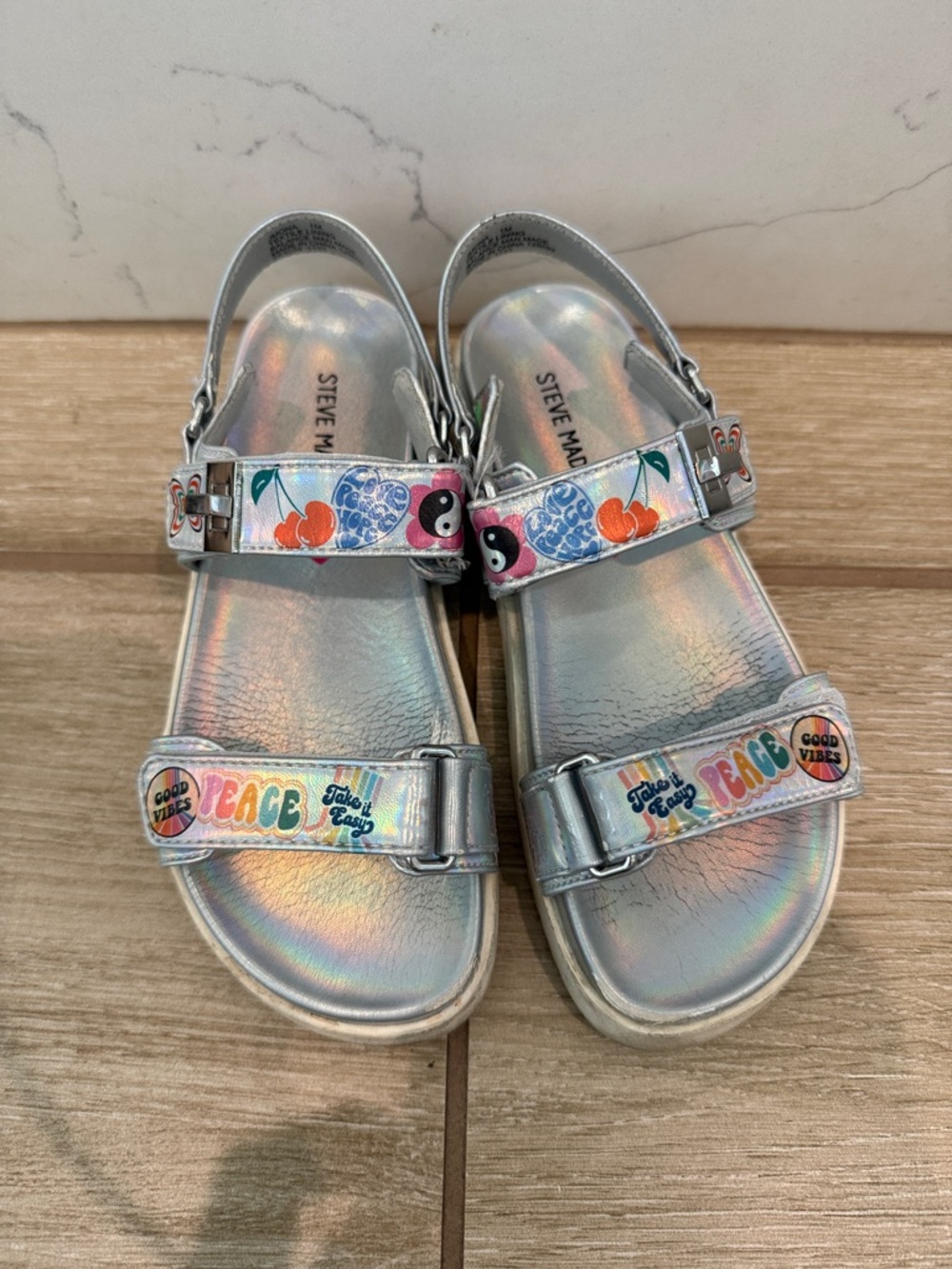 Steve Madden Kids Silver Holographic Peace Strap Sandals with Colorful Graphics